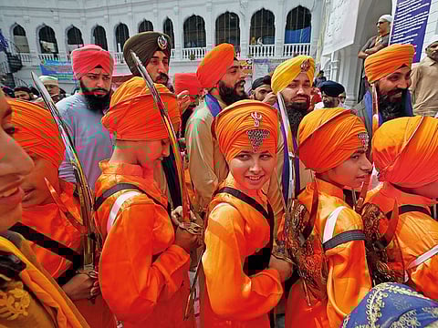 Sikh youth at a ceremony during Basakhi, at the shrine of Gurdwara Punja Sahib, in Hasan Abdal, close to Islamabad.