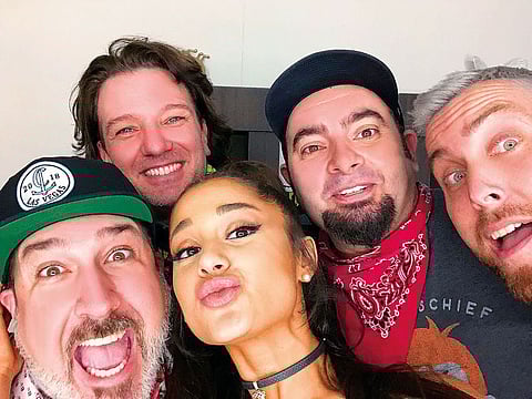 Ariana Grande with members of NSYNC (from left) Joey Fatone, JC Chasez, Chris Kirkpatrick and Lance Bass.