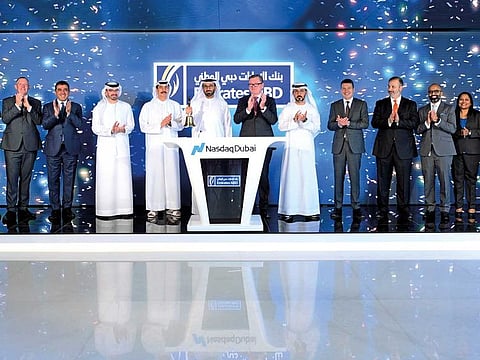 Hesham Abdulla Al Qassim, vice-chairman and managing director of Emirates NBD, rang the market-opening bell yesterday on the Nasdaq Dubai to celebrate the listing of a $1 billion conventional bond. The bank has of late driven gains on the DFM.