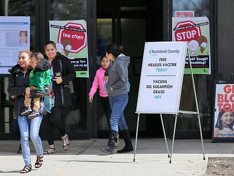 Signs advertising free measles vaccines and information about measles are displayed at the Rockland County Health Department, in Pomona, New York.  