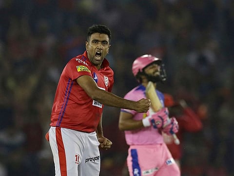Ravichandran Ashwin, captain of Kings XI Punjab celebrates the wicket of Rahul Tripathi of Rajasthan Royals.