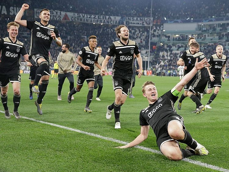 Ajax's Matthijs de Ligt and teammates celebrate