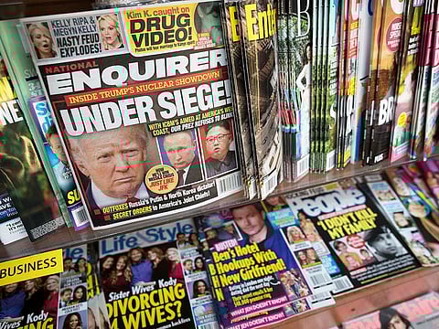 an issue of the National Enquirer featuring President Donald Trump on its cover is displayed on a newsstand in a store in New York.