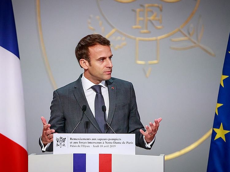 2019-04-18T123307Z_1833043454_RC197D317800_RTRMADP_3_FRANCE-NOTREDAME-FIREFIGHTERS-MACRON-(Read-Only)