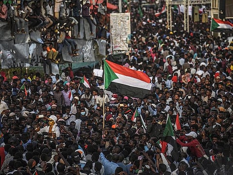 Sudanese protesters rally outside the army complex in Sudan's capital Khartoum.