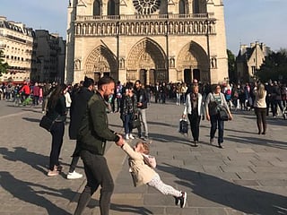 Found at last, social media helps to trace father-daughter from viral Notre-Dame picture