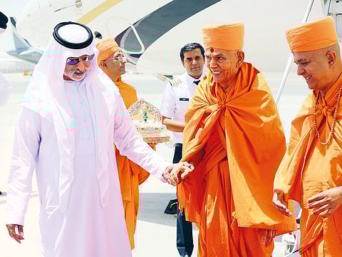 Shaikh Nahayan Mabarak Al Nahayan with Swami Maharaj at Al Maktoum International Airport in Dubai.