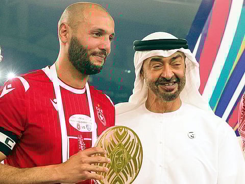 Shaikh Mohammad Bin Zayed with Etoile du Sahel captain Yassine Chikhaoui at the Zayed Champions Cup.