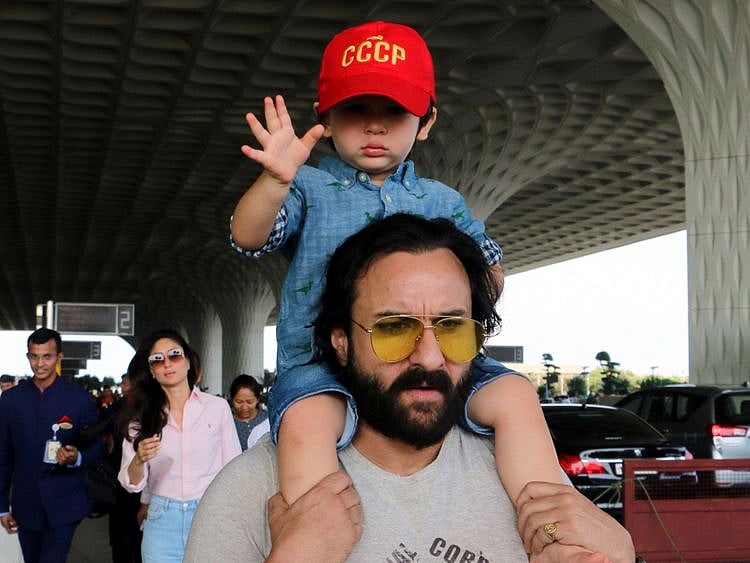 tab--Saif-Ali-Khan-with-Taimur-at-the-airport-(2)-1555834887953