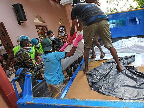 Bodies of blast victims are removed from St. Sebastian’s Church in Negombo, north of Colombo, Sri Lanka, April 21, 2019. 