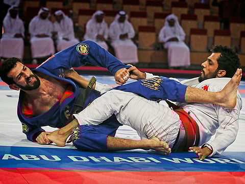 UAE’s 2018 Asian Games silver medallist Taleb Al Kerbi (right) in action against Brazilian Thiago Marques in the final match.