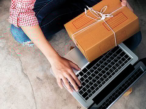 An online seller checking customer orders. Picture used for illustrative purposes.