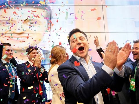 Ukrainian presidential candidate Volodymyr Zelenskiy reacts following the announcement of the first exit poll in a presidential election at his campaign headquarters in Kiev, Ukraine April 21, 2019.