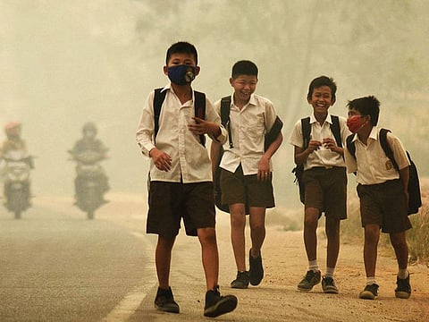 Students are released from school early due to the haze in Indonesia’s Jambi province.