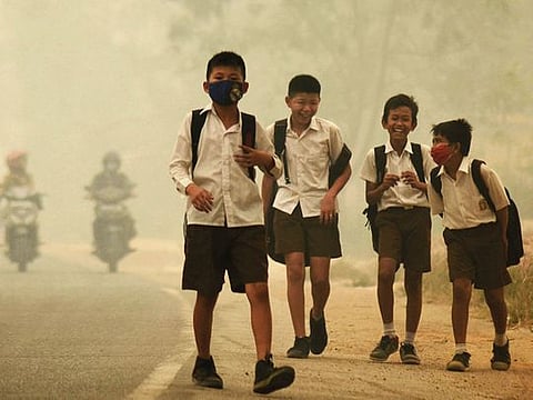 Students are released from school early due to the haze in Indonesia’s Jambi province.