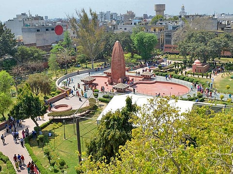 Indian visitors gather near the Jallianwala Bagh Martyrs' Memorial ahead of the 100th anniversary of the Jallianwala Bagh massacre in Amritsar on April 7, 2019.