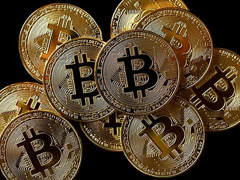A collection of Bitcoin (virtual currency) tokens are displayed in this picture illustration.