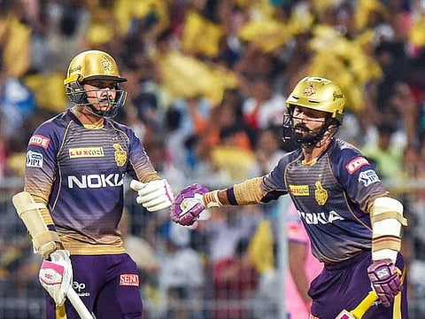 Kolkata Knight Riders  batsmen Sunil Narine  and Dinesh Karthik during the Indian Premier League 2019 cricket against Rajasthan Royals at Eden Garden in Kolkata, Thursday, April 25, 2019