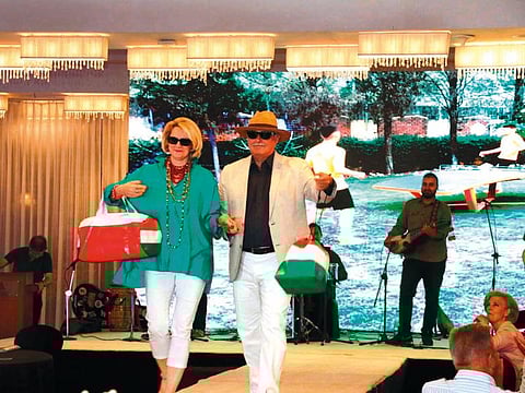 Hungarian Ambassador Istvan Szabo and his wife show upcycled plastic bags prepared by the survivors of the 2005 earthquake during the launch of the ‘Project Miracle’ event in Islamabad to raise awareness of plastic pollution.