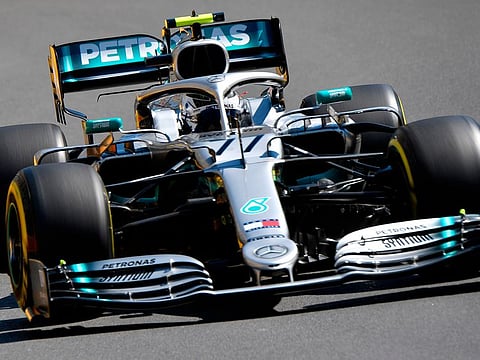Mercedes’ Valtteri Bottas steers his car during the third practice session in Baku on Saturday.