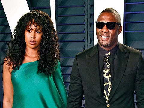 Idris Elba (right) and Sabrina Dhowre.