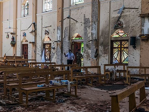 Investigators in Negombo, Sri Lanka, on Monday, April 22, 2019, at the scene of a suicide bombing at St. Sebastian Church. 