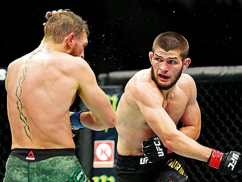 Khabib Nurmagomedov (right) fights Conor McGregor during the UFC 229 at T-Mobile Arena last year. The Russian will defend his lightweight world title against Poirier of the US.