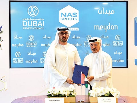 Saeed Hareb and Mohammad Abdul Nasser Al Khayat at the official signing of the sponsorship agreement.