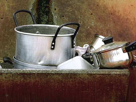 Dirty pots and pans. For illustrative purposes only.