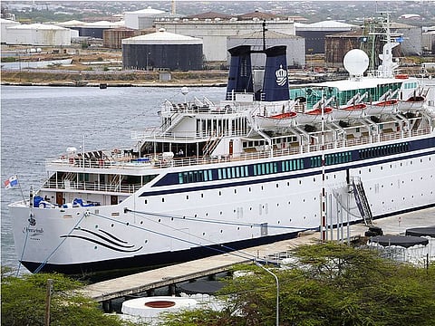A 440-foot ship owned and operated by the Church of Scientology, SMV Freewinds, is docked under quarantine from a measles outbreak in port in Willemstad, Curacao, May 4, 2019. 