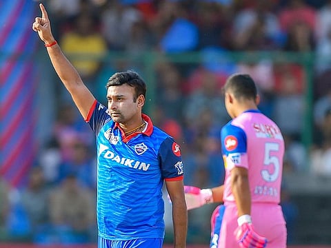 Dehli’s Amit Mishra celebrates a wicket during the IPL match against Rajasthan in New Delhi on Saturday. 