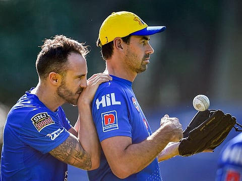 Chennai Super Kings player Faf du Plessis with coach Stephen Fleming  during a training session in Mohali, Saturday, May 4, 2019. 