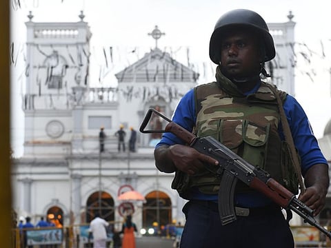 A Sri Lankan soldier stands guard outside St. Anthony's Shrine in Colombo on May 2, 2019, a week after a series of bomb blasts targeting churches and luxury hotels on Easter Sunday in Sri Lanka. 