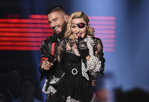 Maluma, left, and Madonna perform "Medellin" at the Billboard Music Awards on Wednesday, May 1, 2019, at the MGM Grand Garden Arena in Las Vegas.