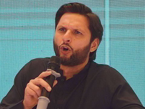 Shahid Afridi speaks during a press conference to present his autobiography in Karachi on May 4, 2019. 