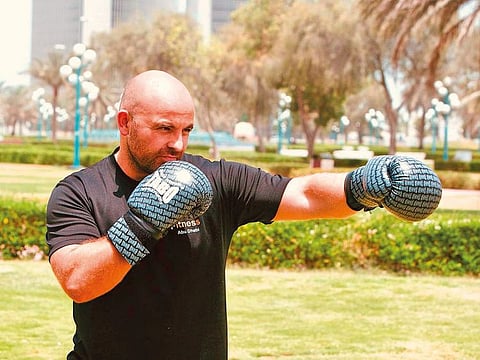 Personal trainer Lee Harrison runs a bootcamp in Abu Dhabi.