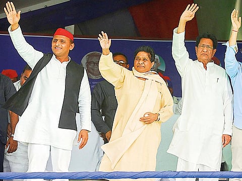 Samajwadi Party President Akhilesh Yadav, Bahujan Samaj Party chief Mayawati, RLD chief Ajit Singh, at an election rally during Lok Sabha polls campaign, in Azamgarh, on Wednesday.