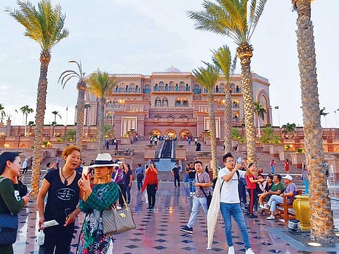 Tourists at the Emirates Palace in Abu Dhabi. New attractions including Warner Bros World Abu Dhabi and the Al Hosn cultural site provided a significant boost to the emirate’s appeal.