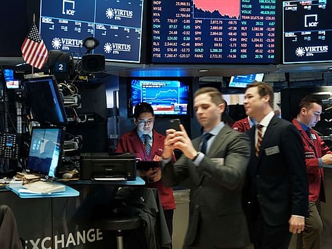 Traders work on the floor of the New York Stock Exchange (NYSE) in New York City.