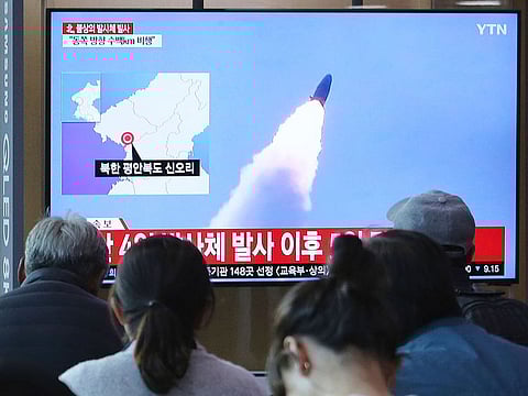 File picture: People watch a TV showing file footage of North Korea's missile launch during a news program at the Seoul Railway Station in Seoul, South Korea.