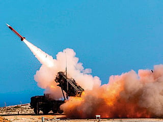 A Patriot missile defence system launches an interceptor missile during an exercise in Greece. Saudi Arabia is investigating how Houthi missiles and drones penetrated its air defences during deadly attacks on Riyadh airport.  