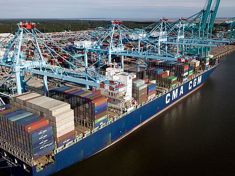 A container ship is unloaded at the Virginia International Gateway terminal in Norfolk, Virginia. China said it will suspend the planned addition of 10 per cent and 5 per cent tariffs on some US imports.