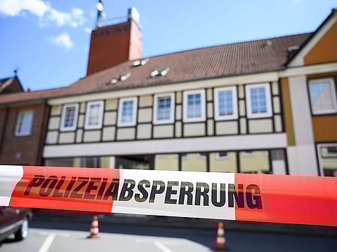 A house is cordoned off in Wittingen, northern Germany, where two bodies were found on May 13, 2019 during investigations into the deaths of three people discovered in a Bavarian hotel room and killed by crossbow bolts.
