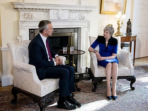 Jens Stoltenberg, secretary general of the North Atlantic Treaty Organization (NATO), left, speaks with Theresa May, U.K. prime minister, during a bilateral meeting inside number 10 Downing Street in London, on Tuesday, May 14, 2019.
