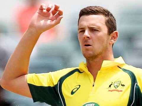 Josh Hazlewood took 2-19 from his four overs to help Australia claim a five-wicket win over South Africa in their Twenty20 World Cup opener on Saturday, continuing his sparkling form from the Indian Premier League.