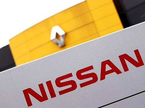 The logos of car manufacturers Renault and Nissan are seen in front of a common dealership of the companies in Saint-Avold, France.