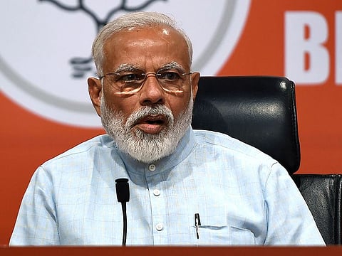 Indian Prime Minister Narendra Modi takes part in a press conference in New Delhi. 