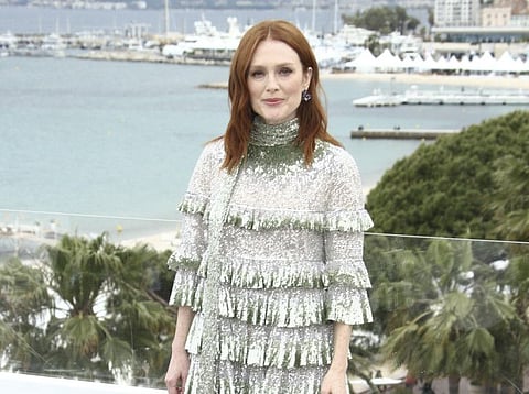 Actress Julianne Moore poses for photographers at the photo call for the film 'The Staggering Girl' at the 72nd international film festival, Cannes, southern France, Friday, May 17, 2019.