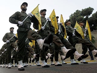 Hezbollah fighters march in a parade in this file photo.