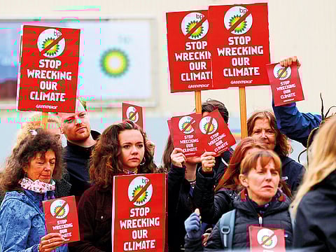 Climate change activists demonstrate outside the BP AGM in Aberdeen, Britain.